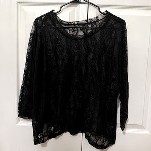Lacy black long sleeve shirt.